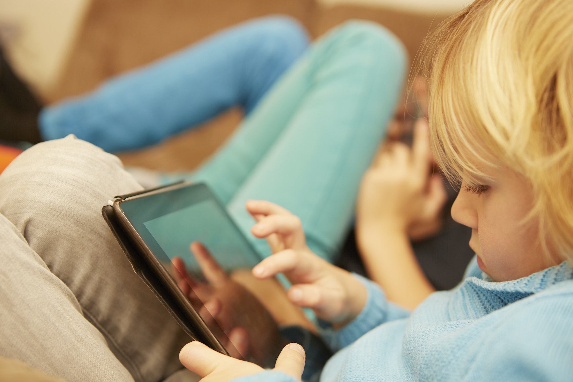 Child using digital tablet